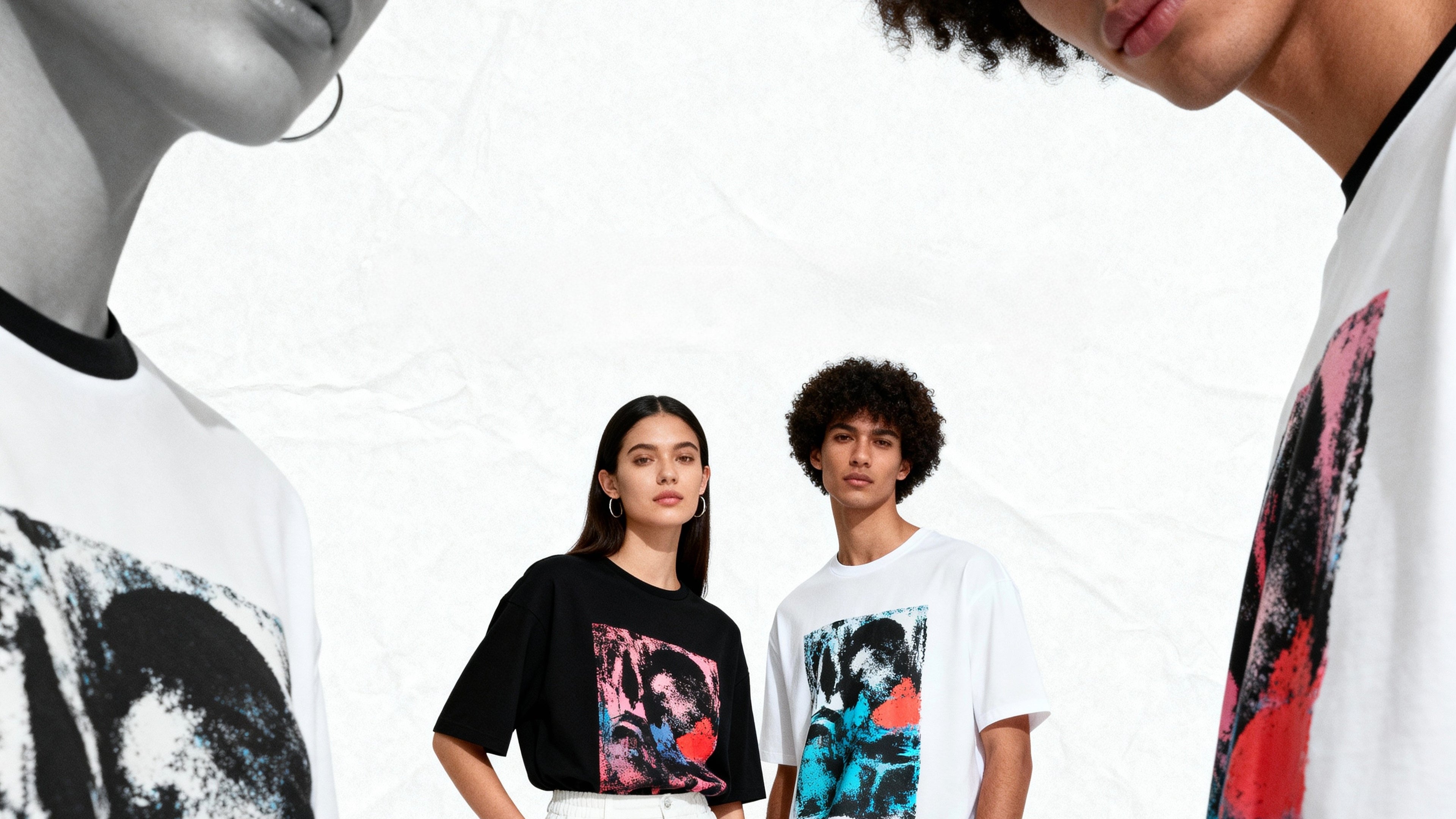 People wearing t-shirts with graphic designs on a white background